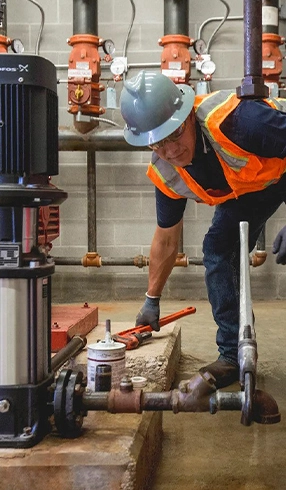 man holds extinguisher